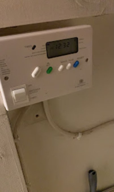 Wall-mounted programmer